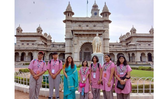 Students of Jodhamal posing along with a teacher at Ajmer.