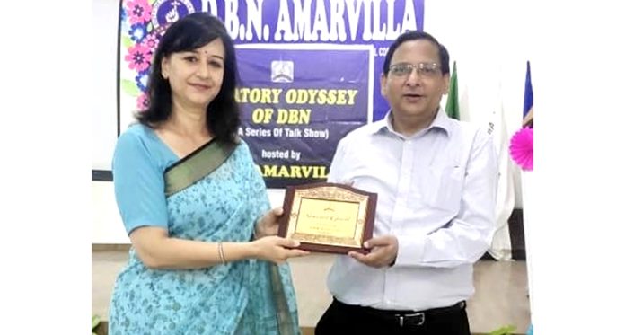 PF Commissioner Rizwan Uddin receiving memento from school principal on Wednesday.