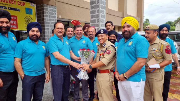 ADGP Jammu Anand Jain receiving bouquet from organisers at Jammu.