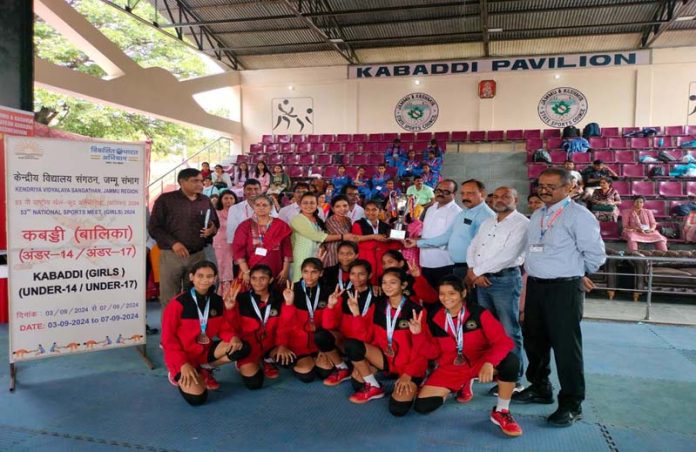 Dignitaries presenting trophy to winning team during 53rd KVS National Sports Meet at Jammu.