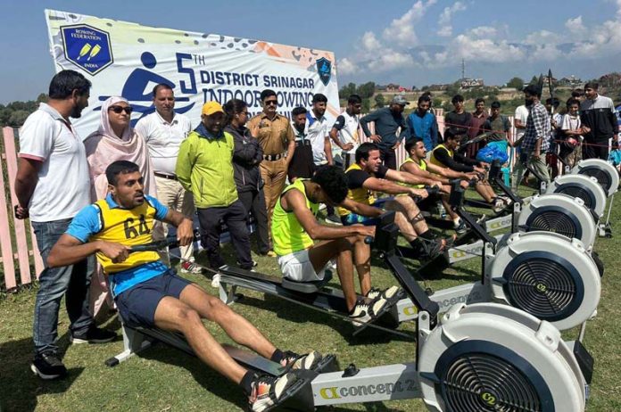 Athletes posing along with dignitaries during 5th Indoor Rowing Championship at Srinagar.