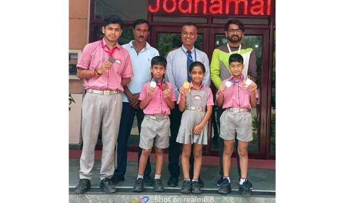 Jodhamal skaters posing along with school management.