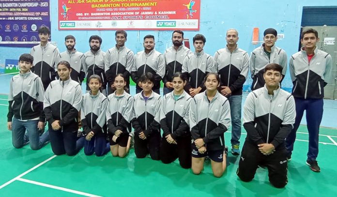 Selected J&K Badminton team posing for group photograph.