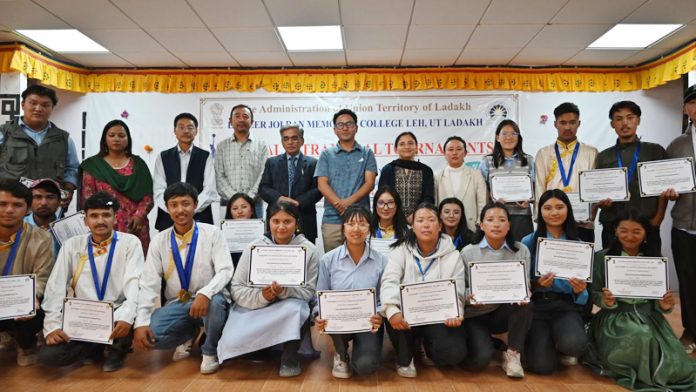 Students of EJM College, Leh posing along with certificates.