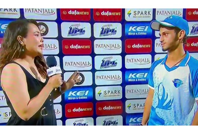 Aarav Mahajan speaking with TV anchor after getting Man of the Match award.