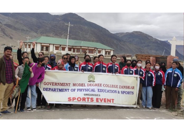 Dignitaries posing along with athletes during sports event at GDC Zanskar.