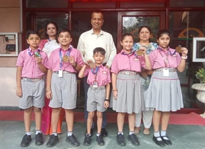 Jodhamal students posing along with school management.