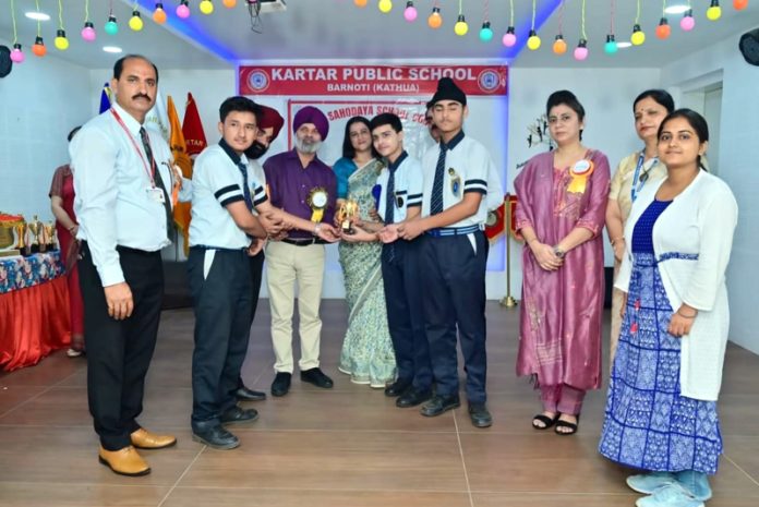 Students of Tiny Scholars School, Kathua posing along with teaching staff.