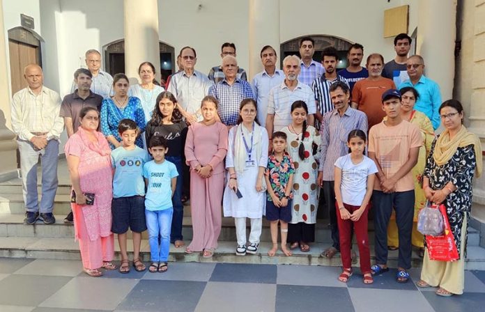 Students posing with office bearers of KPS after getting scholarships at Jammu on Friday.