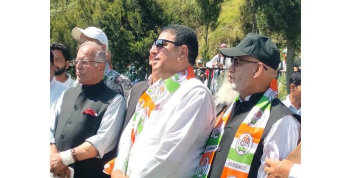 Senior bureaucrat, Rashid Azam Inqlabi with JKPCC president Tariq Hameed Karra and party candidate Iftikhar while joining party in Rajouri on Tuesday.