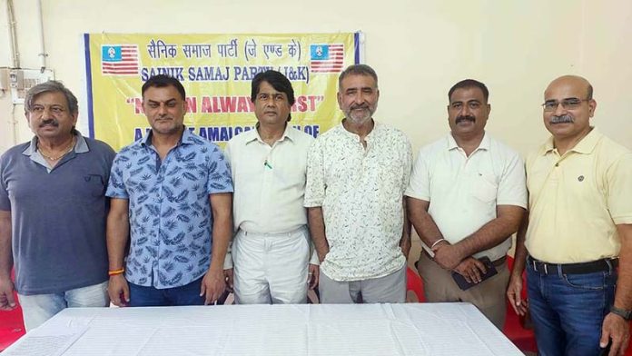 Colonel SS Pathania, president of SSP posing along with party candidates in Jammu on Friday.