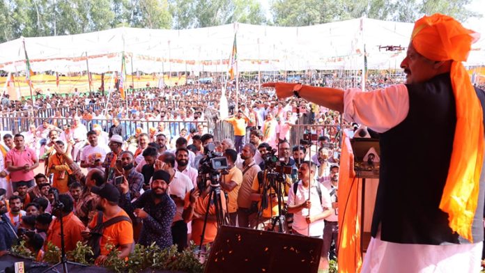 Senior BJP leader Devender Singh Rana addressing a rally at Nagrota on Thursday.