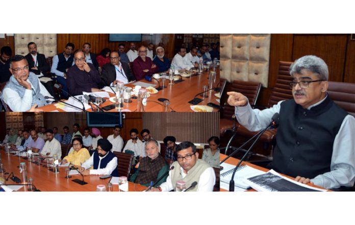 Chief Secretary Atal Dulloo chairing a meeting at Srinagar on Friday.