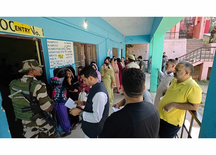 Voters in queue at a Polling Station in Ramban on Wednesday. -Excelsior/Parvez Mir