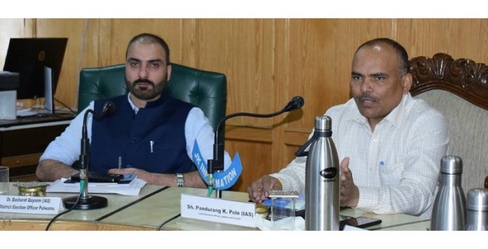 CEO Pandurang K Pole chairing a meeting at Pulwama.