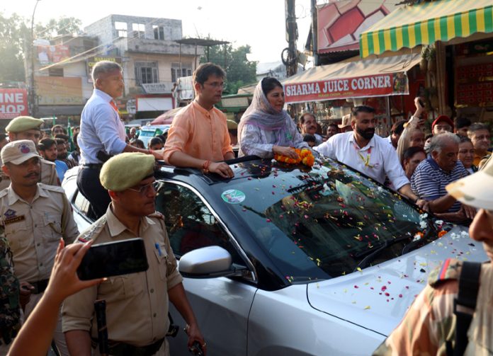 Mehbooba Mufti leading road show in Jammu city on Wednesday in support of PDP candidate. -Excelsior/Rakesh