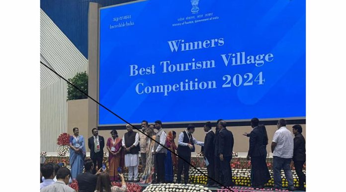 Dignitaries during announcement of Best Tourism Village Award.