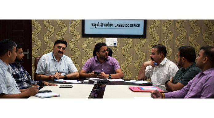 District Election Officer Sachin Kumar Vaishya chairing a meeting on Wednesday.