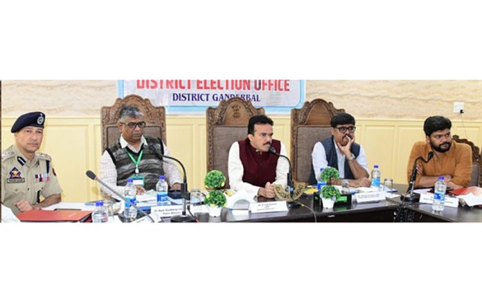 Observers chairing a meeting at Ganderbal.