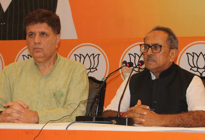 Former Deputy Chief Minister Dr Nirmal Singh and BJP chief spokesperson, Sunil Sethi at a press conference at Jammu on Thursday. —Excelsior/Rakesh