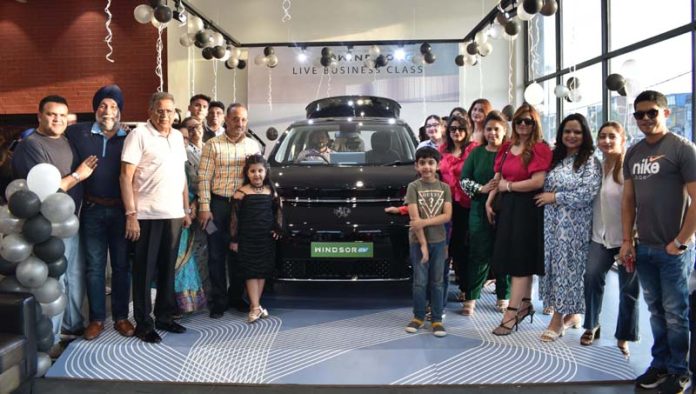 Dignitaries during the launch of CUV MG Windsor in Jammu on Saturday.