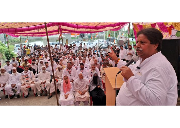 Cong leader Raman Bhalla addressing public meeting in R S Pura.