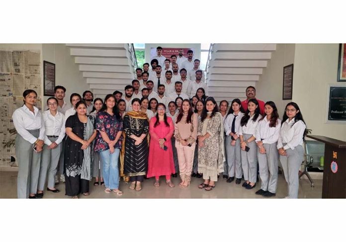 Muskan Gupta with students and faculty members of ICccR &HRM during interaction programme at JU on Friday.