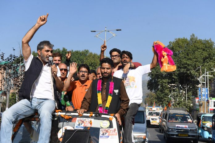 BJP candidate Aijaz Hussain during a rally in Lal Chowk at Srinagar. —Excelsior/Shakeel