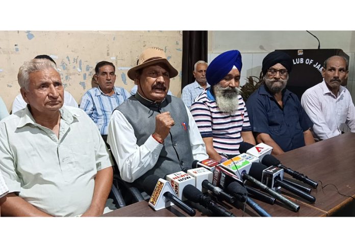 Capt K L Sharma alongwith other refugee leaders addressing a press confernece in Jammu.