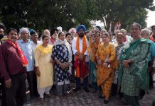 Taranjit Singh Tony, senior Congress leader posing with the people in Jammu on Wednesday.