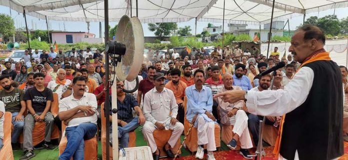 Senior BJP leader Devender Singh Rana during election rally.