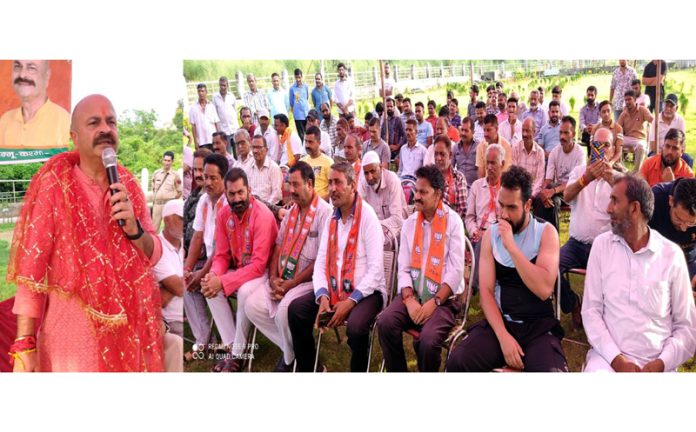 BJP vice president and party candidate, Yudhvir Sethi addressing an election rally at Majeen in Jammu on Tuesday.