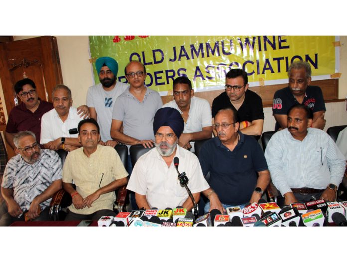 Old Wine Traders of J&K addressing a press conference at Jammu on Friday. -Excelsior/Rakesh