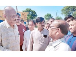 Senior Cong leader Mula Ram during visit to Phallain Mandal in Jammu on Friday.