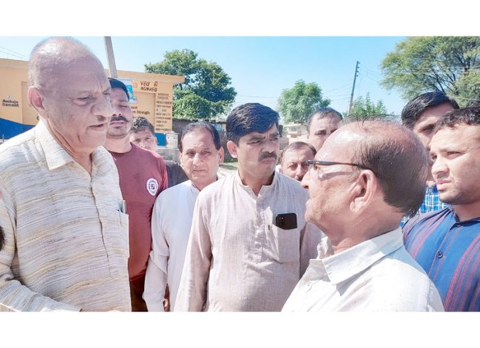 Senior Cong leader Mula Ram during his visit to Phallain Mandal in Jammu on Friday.