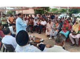 BJP candidate from Ramgarh and former Minister, D K Manyal addressing an election meeting in his constituency on Friday.