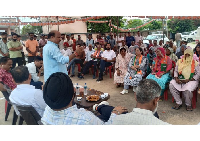 BJP candidate from Ramgarh and former Minister, D K Manyal addressing an election meeting in his constituency on Friday.