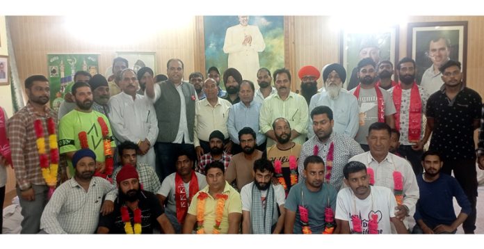 Senior NC leaders, Rattan Lal Gupta and others during joining function in Jammu on Tuesday.