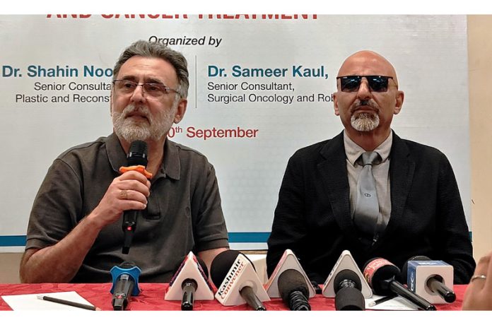 Dr Shahin Nooreyezdan and Dr Sameer Kaul from Indraprastha Apollo Hospitals during a press conference at Srinagar.