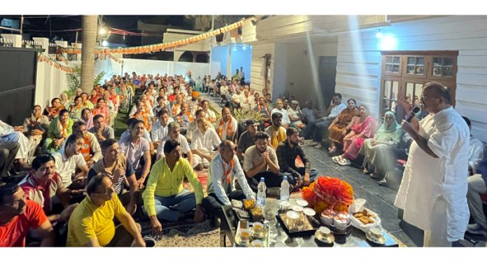 Former Minister and BJP candidate from Vijaypur, Chander Parkash Ganga addressing an election meeting on Tuesday.