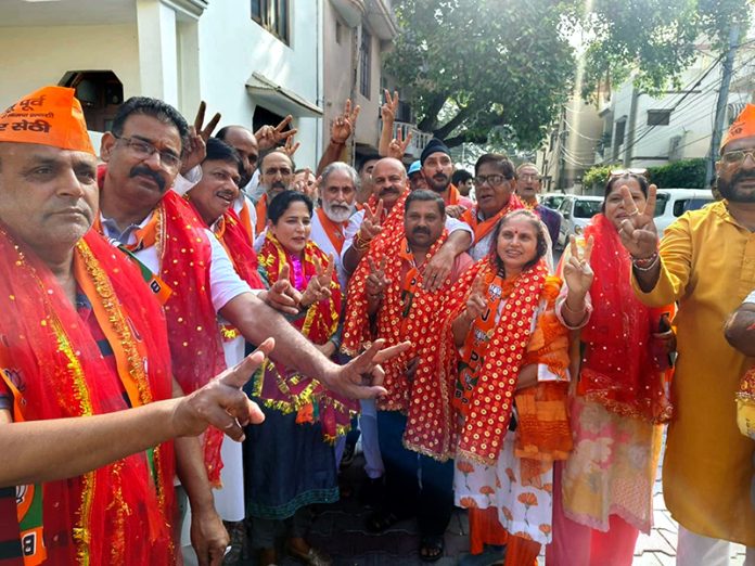 BJP candidate from Jammu East during a meeting in his constituency on Wednesday.