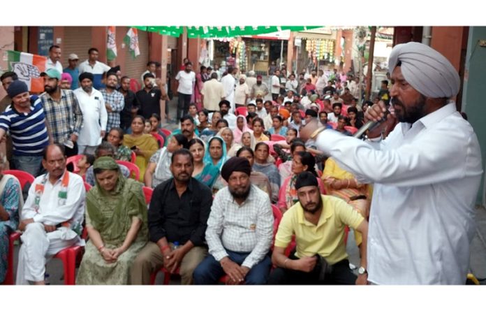 Senior Congress leader Taranjit Singh Tony addressing a public rally in Jammu on Friday.