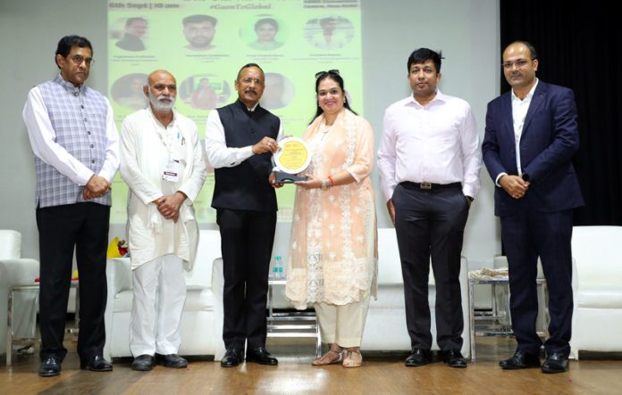 Varuna Anand receiving Bharat Entrepreneur Award in New Delhi.