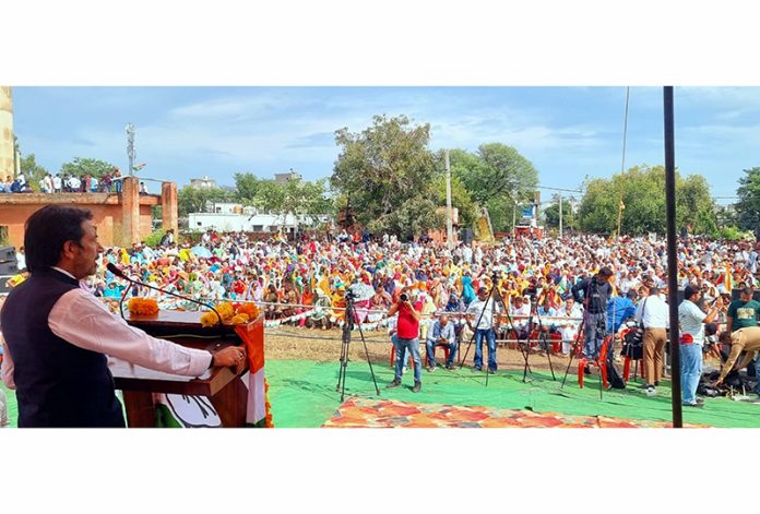 AICC gen secy G A Mir addressing a large public rally at Khour on Friday.