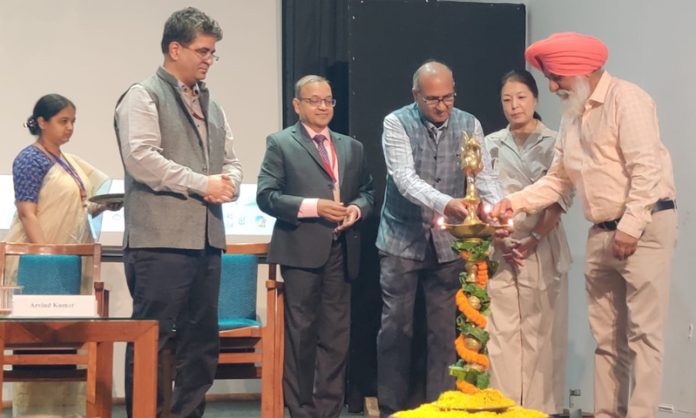 Dignitaries during a symposium at New Delhi.