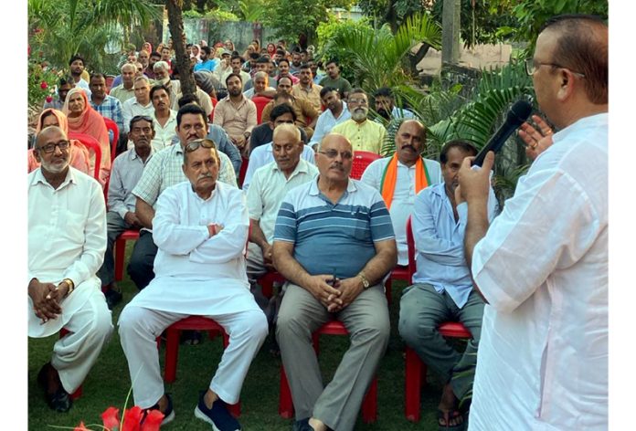 BJP candidate Chander Parkash Ganga during an election meeting in Vijaypur constituency on Friday.