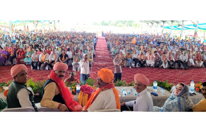 Former Minister and BJP candidate from Vijaypur CP Ganga along with MP Jugal Kishore Sharma at an election rally at Tandikhui, Vijaypur on Wednesday.