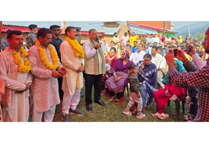 BJP national general secretary, Tarun Chugh along with party candidate, Balwant Singh Mankotia addressing a public meeting at Chenani on Sunday.