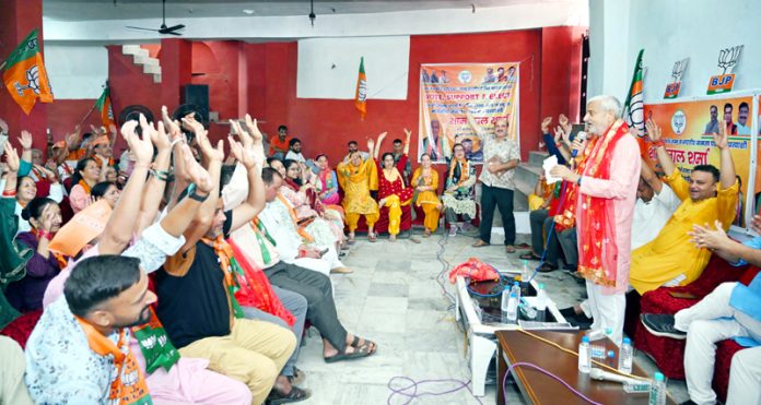 Senior BJP leader Sham Lal Sharma addressing party workers on Sunday.