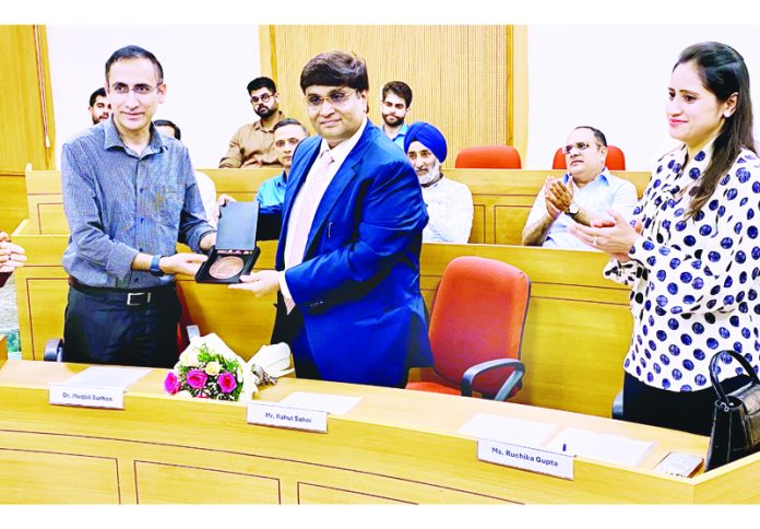 A dignitary being greeted with a memento during an Angel investment master class event held in Jammu on Sunday.